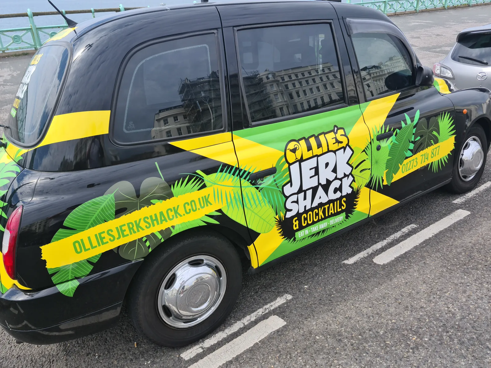 Ollie's Jerk Shack wrapped taxi