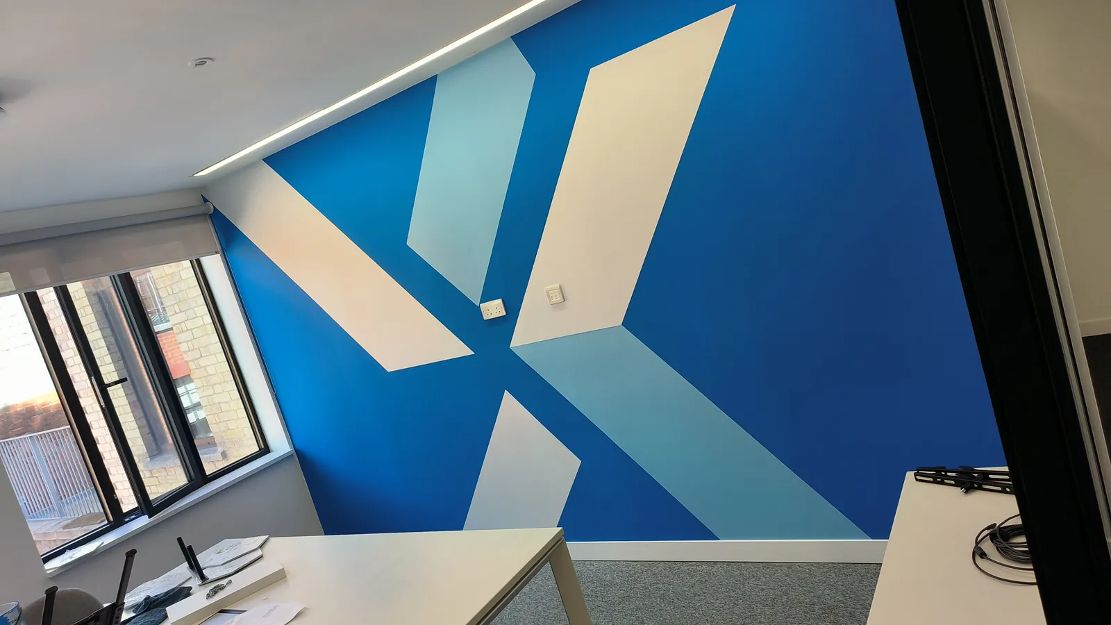 Blue geometric office wall graphic
