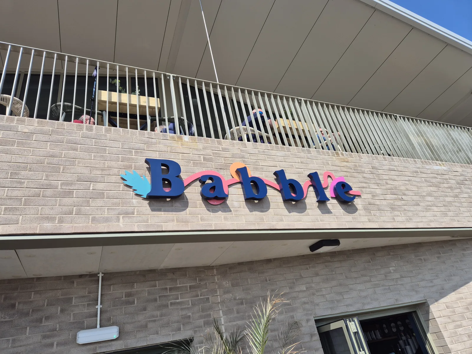 Babble lettering on a building facade