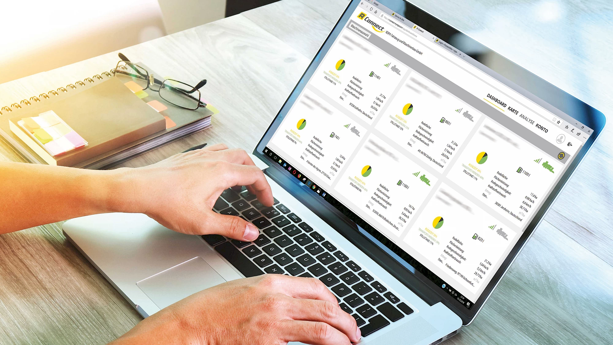 A laptop displaying the R-Connect main screen