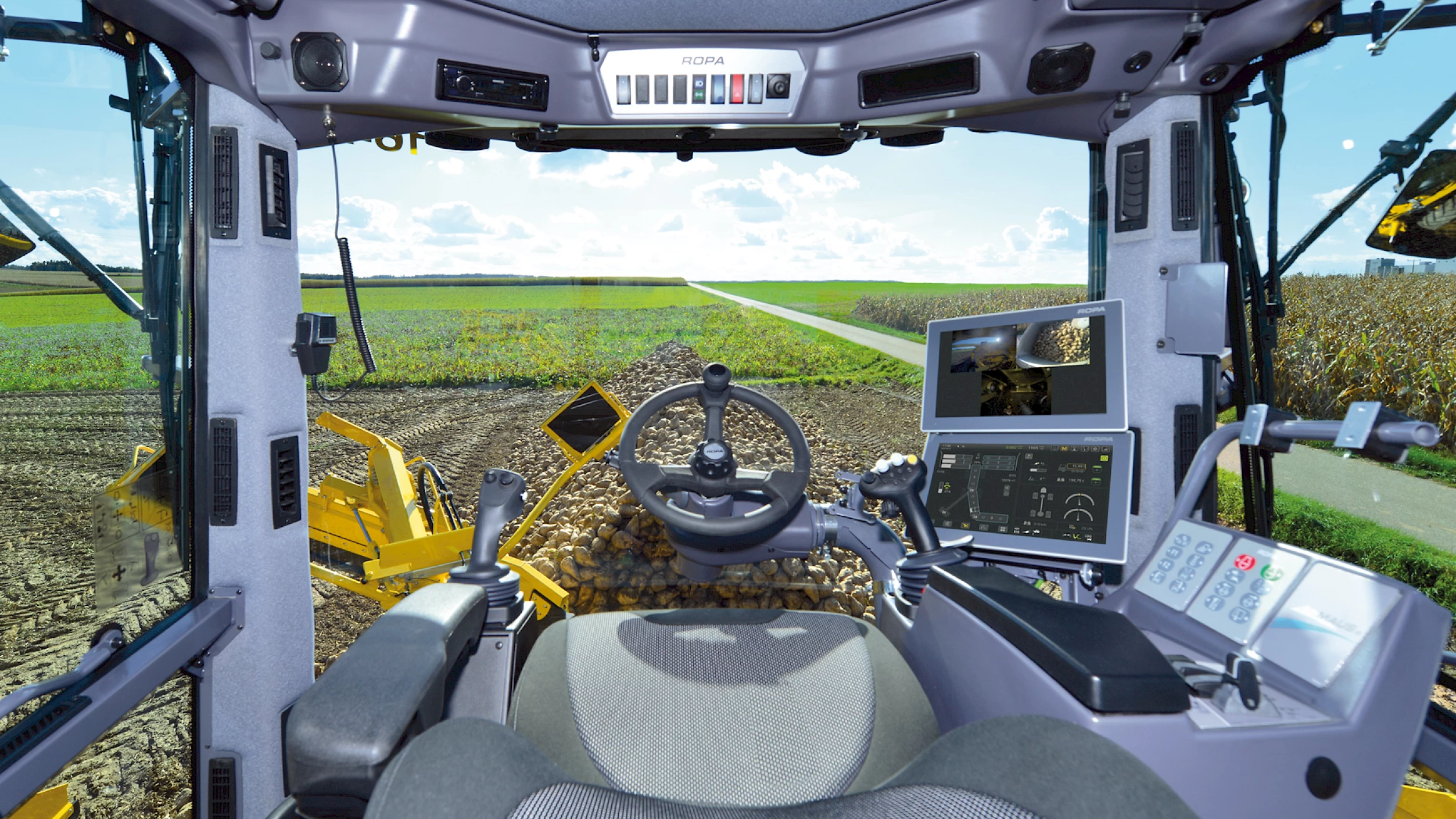 A fish-eye view of the ROPA Maus 6 cabin from the operator's seat