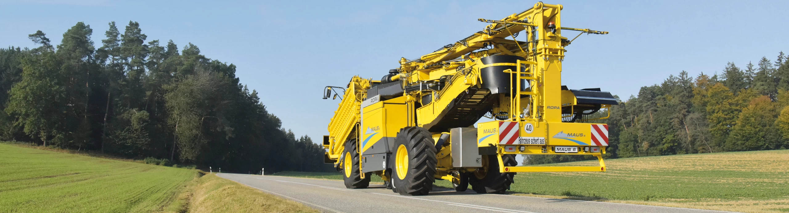A ROPA Maus 6 travelling down the road from a behind-the-machine perspective
