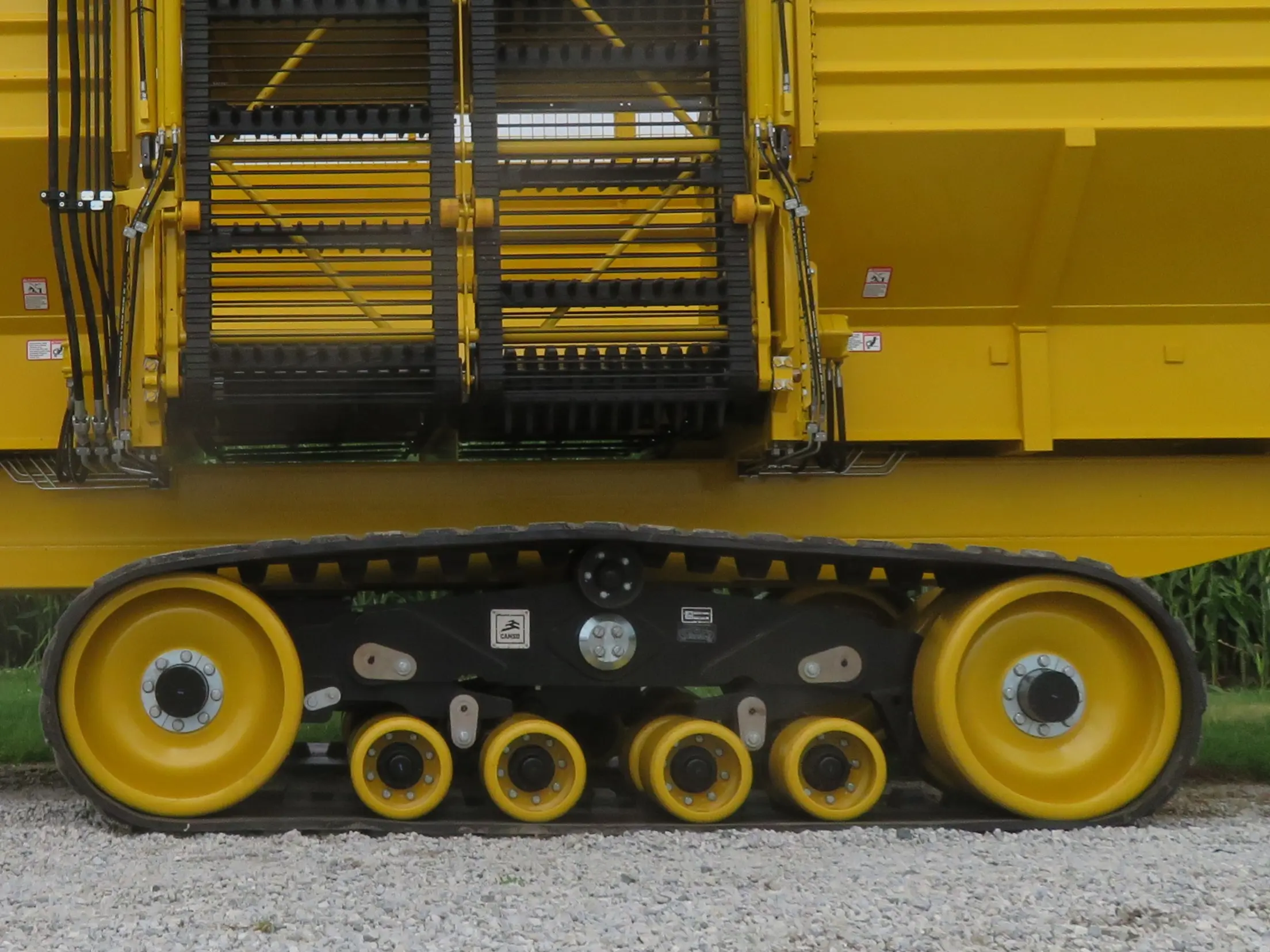 Close-up of Camso tracks under the Big Bear beet cart
