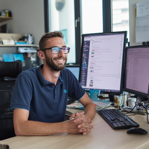 Help desk technician resolving technical support issues