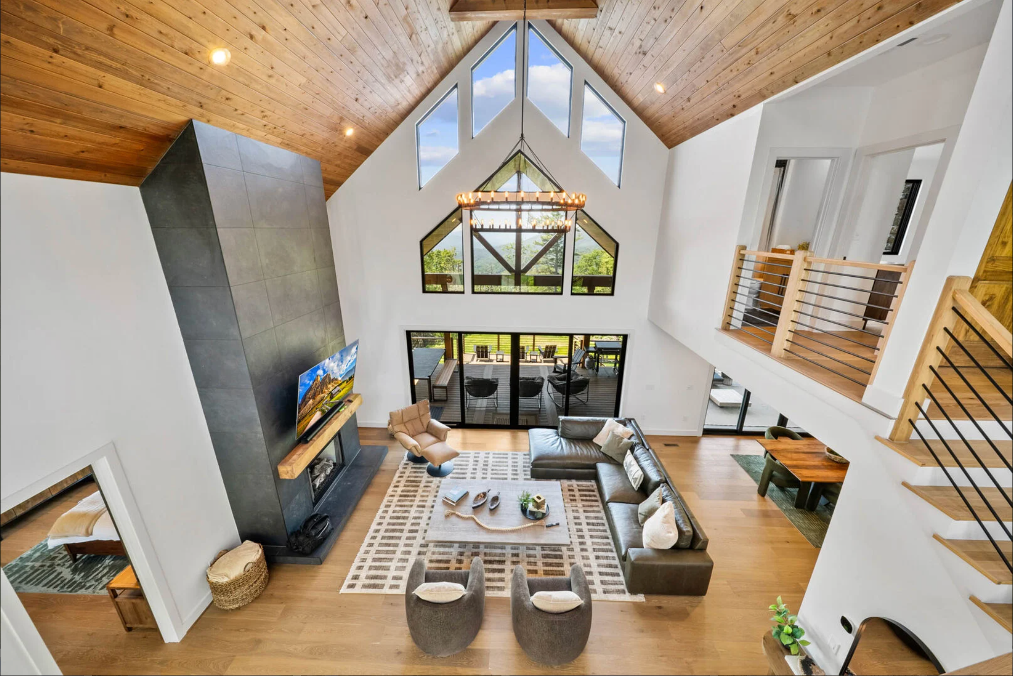 Elk and Shepherd Lodge great room with vaulted wood ceiling
