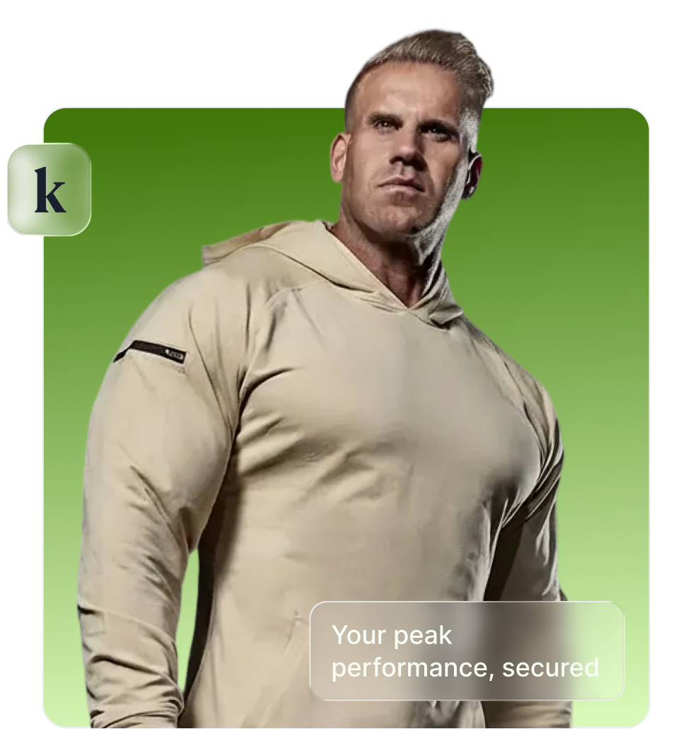Muscular man wearing a beige hoodie standing confidently against a green gradient background with text 'Your peak performance, secured.'