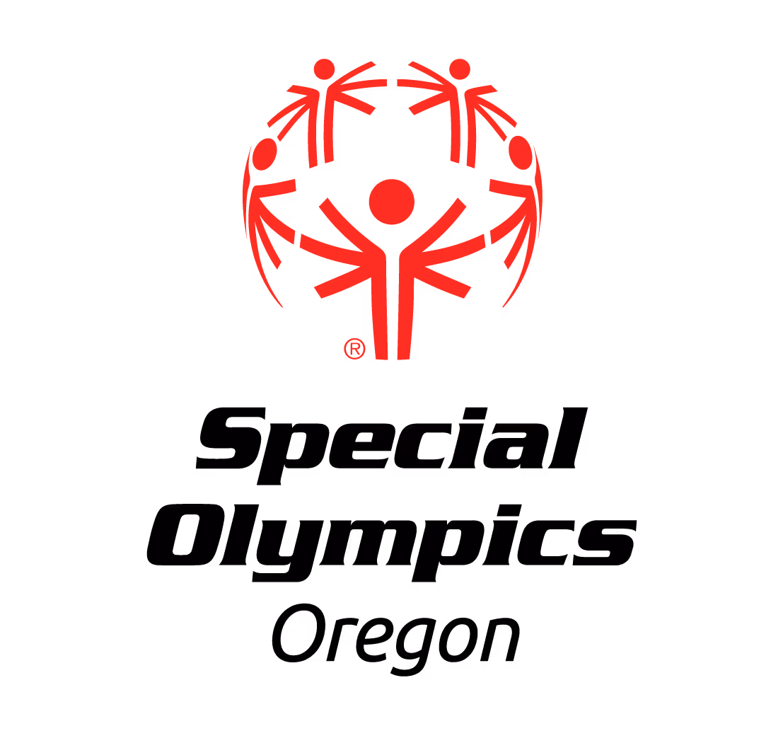 Red and black abstract pattern resembling the outline of a city skyline or industrial structures.