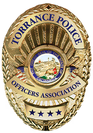Gold police badge for Torrance Police Officers Association featuring the Great Seal of the State of California and four stars at the bottom.