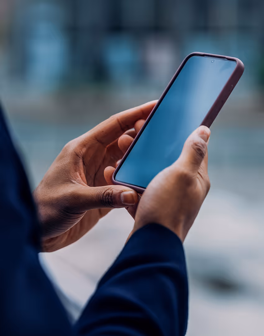 Smartphone held in two hands.