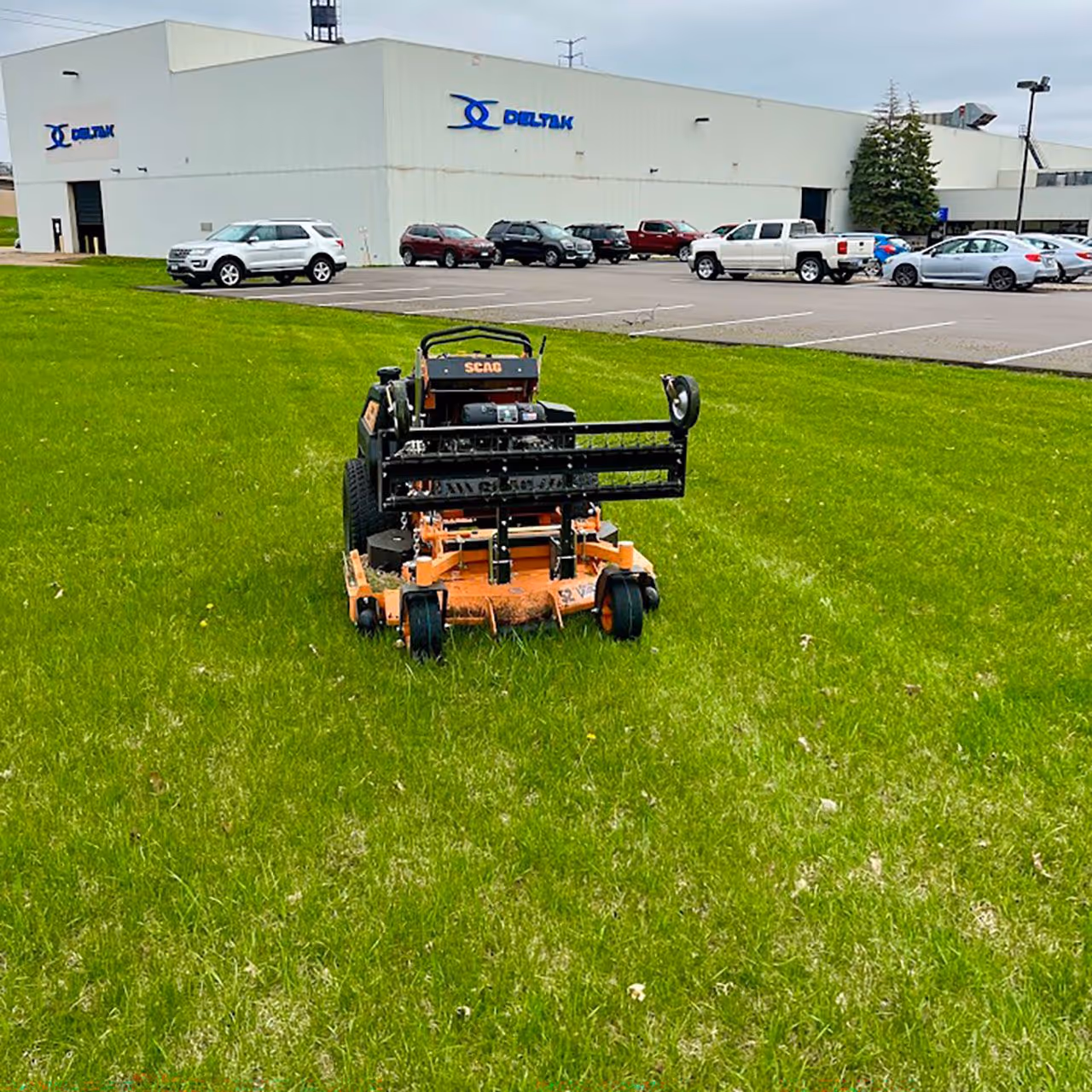 commercial lawn mowing equipment being used by sota landscaping 