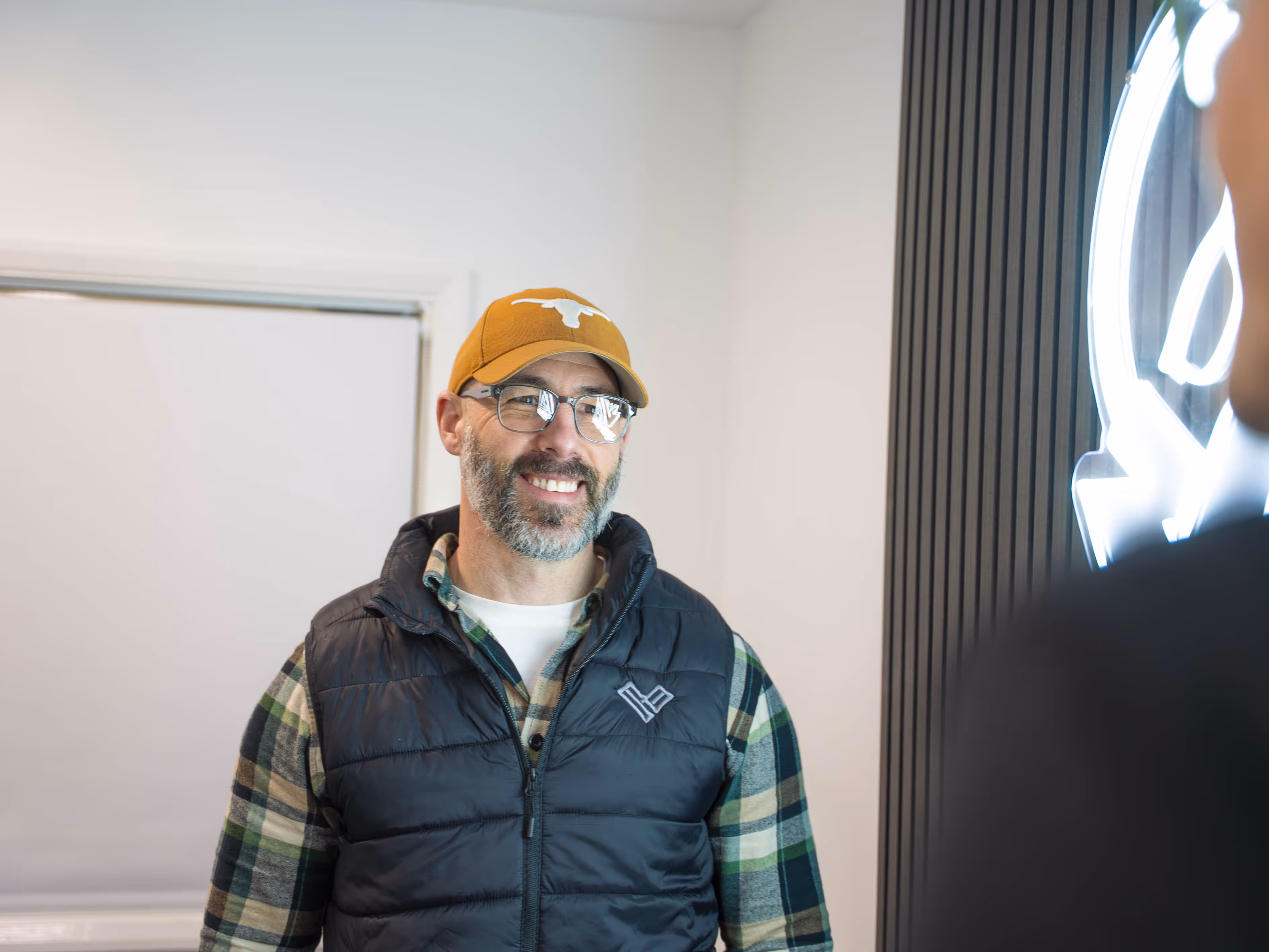 Ian Wilson speaking to a business owner