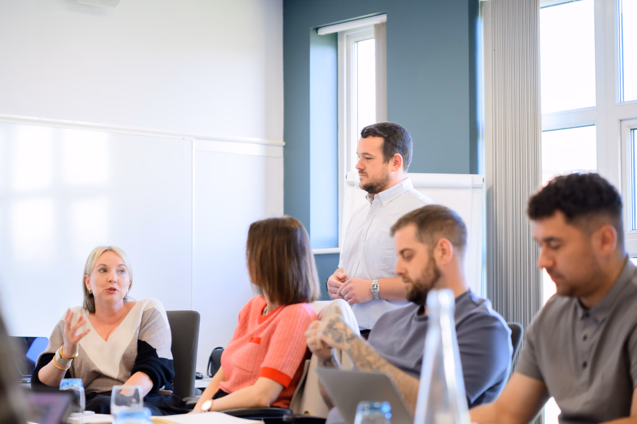 Man talking to a room of business owners