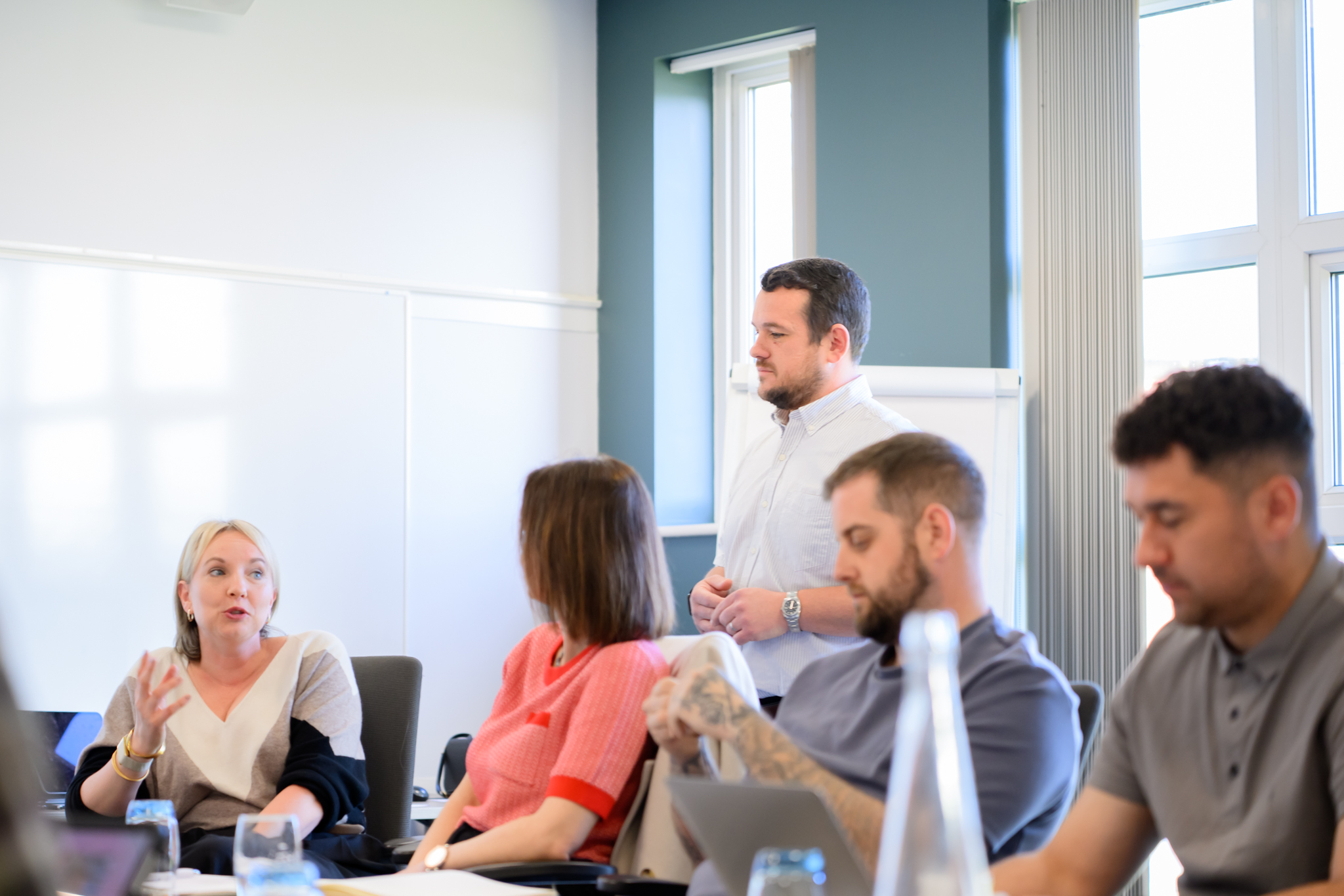 Man talking to a room of business owners