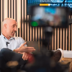 Photo shows marketing MSM Directo chatting to client