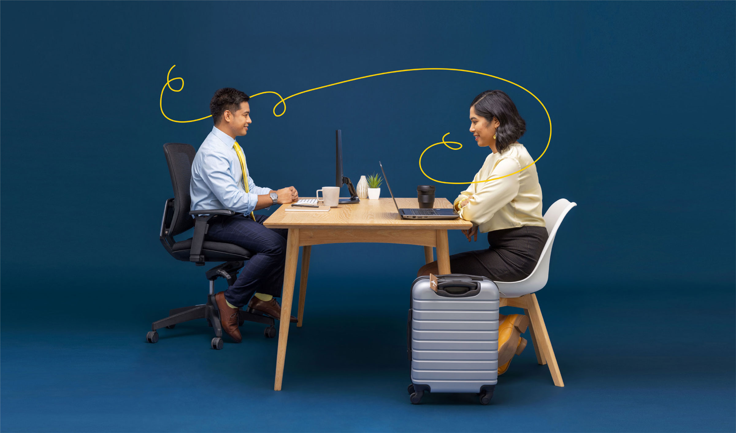 Image of partner branding, showing an accountant and client working together with a yellow line