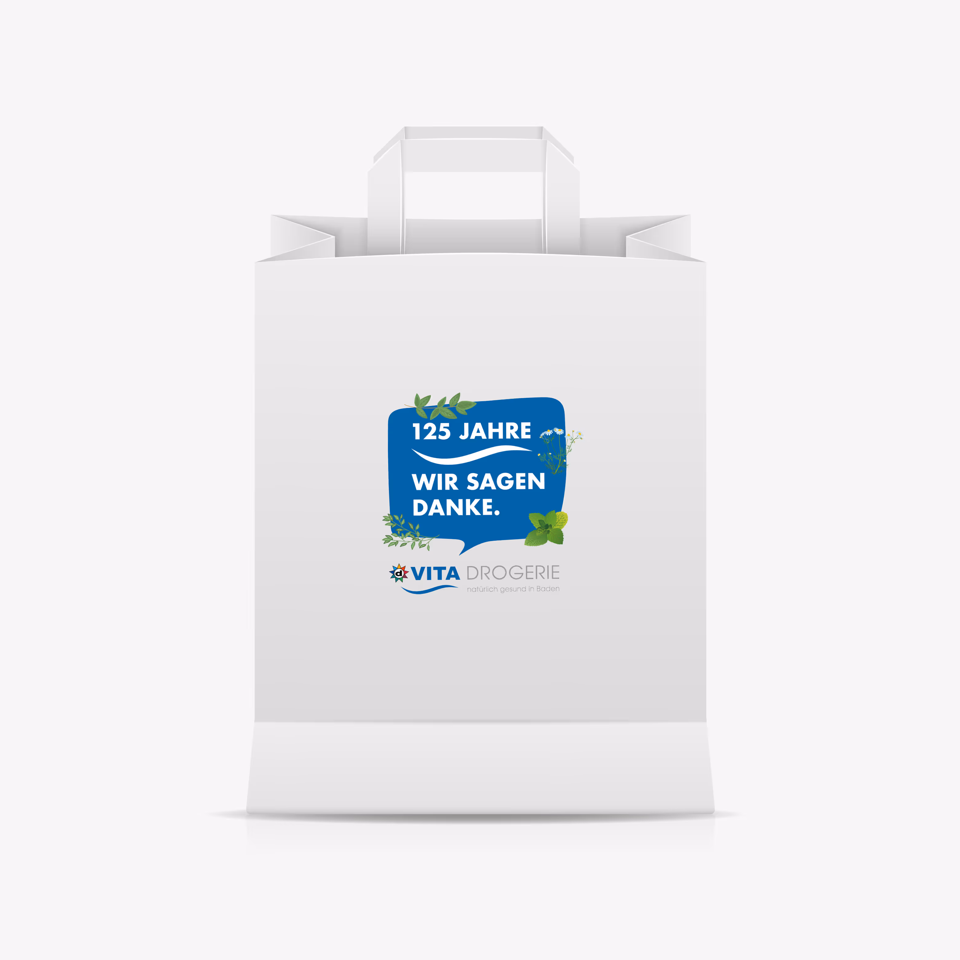 125 Jahre Vita Drogerie Baden: Jubiläumsbranding mit Mailing, Plakat, Busbeschriftung, Beachflags und Aufklebern. Wertschätzung mit System.