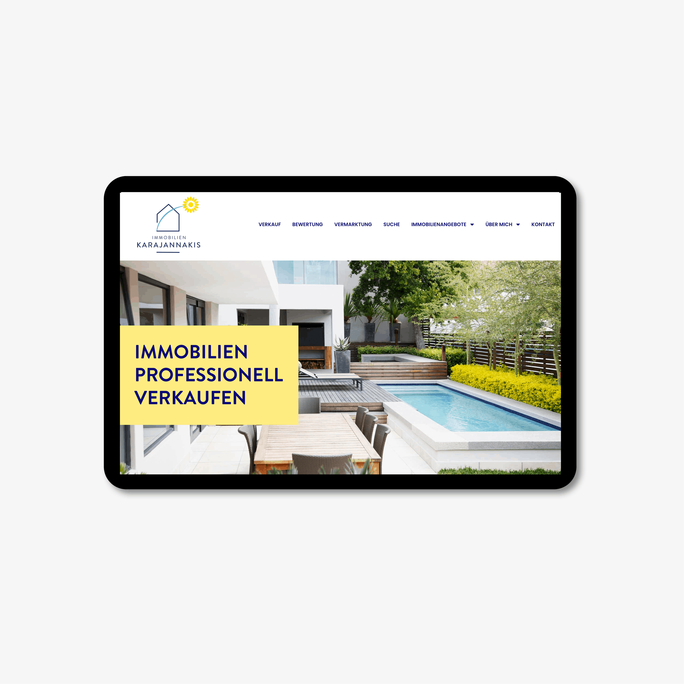 Logo-Design für Immobilien Karajannakis – Logo im Kontext einer Markenanwendung