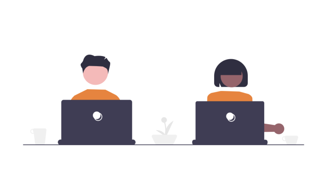 A man and a woman working on a computer at a desk