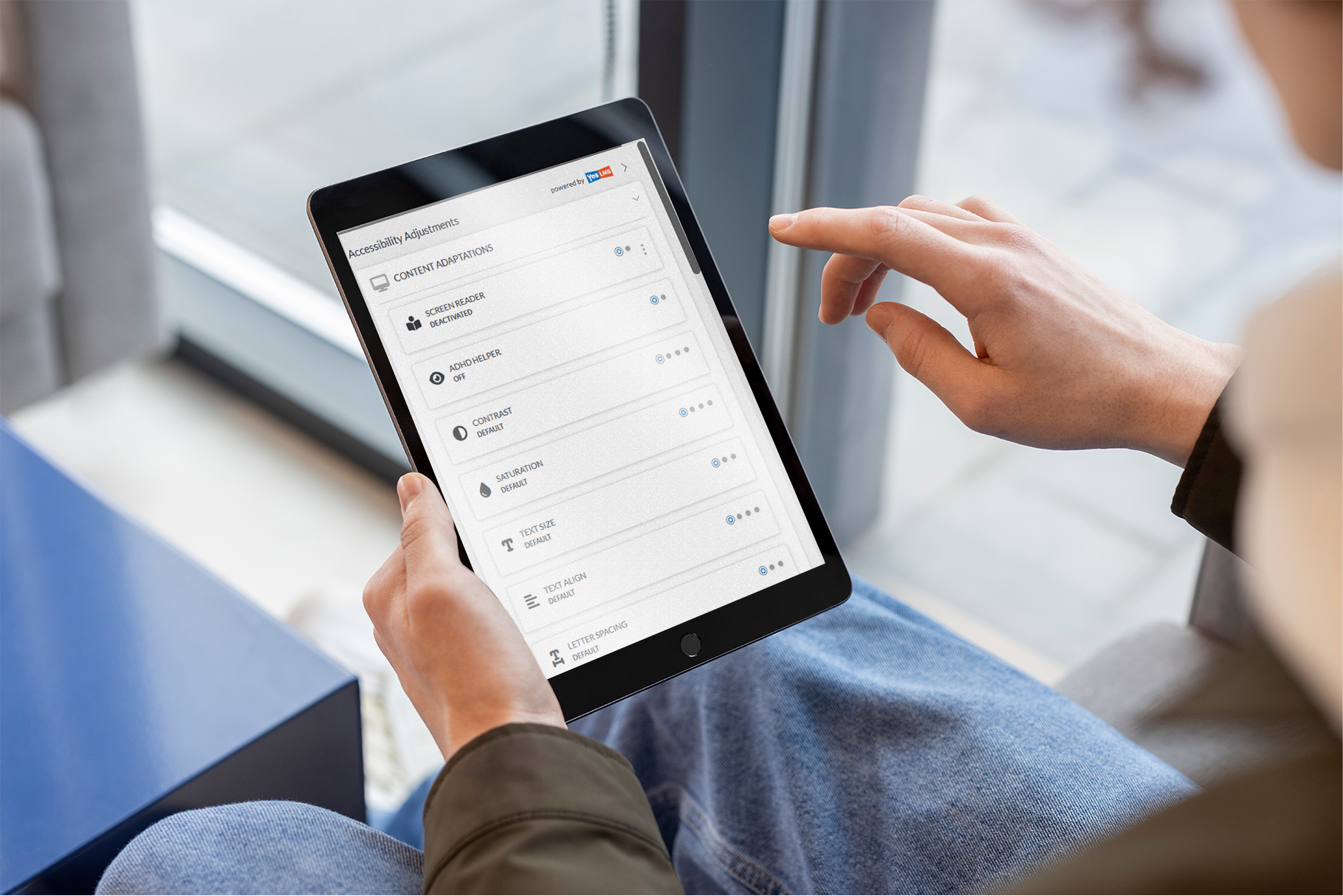 Two people face each other, using ASL signs to communicate.