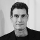 portrait image of a grown man in grayscale