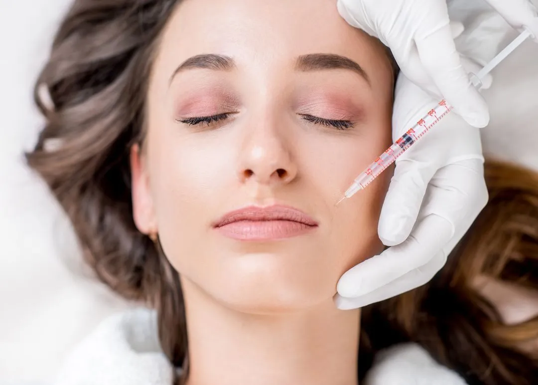 A woman getting an injectable