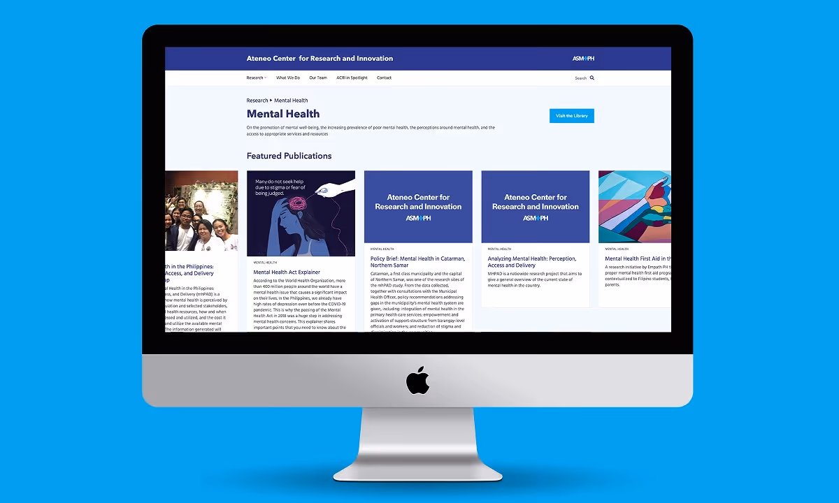 a Macintosh mockup showing Ateneo Center for Research and Innovation's website page about Mental Health.