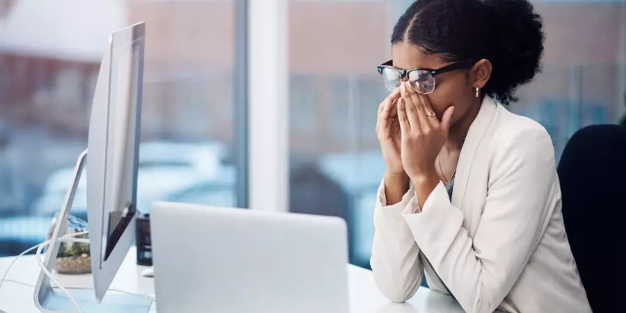 a woman experiencing burn out at work