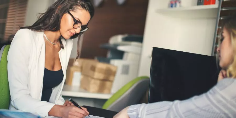 Woman writing down some notes