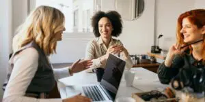 3 change leaders in a meeting