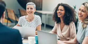 People laughing in an office