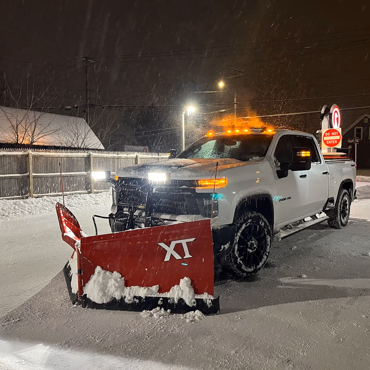 Snow covered commercial property cleared by Higher Ground Property Management LLC
