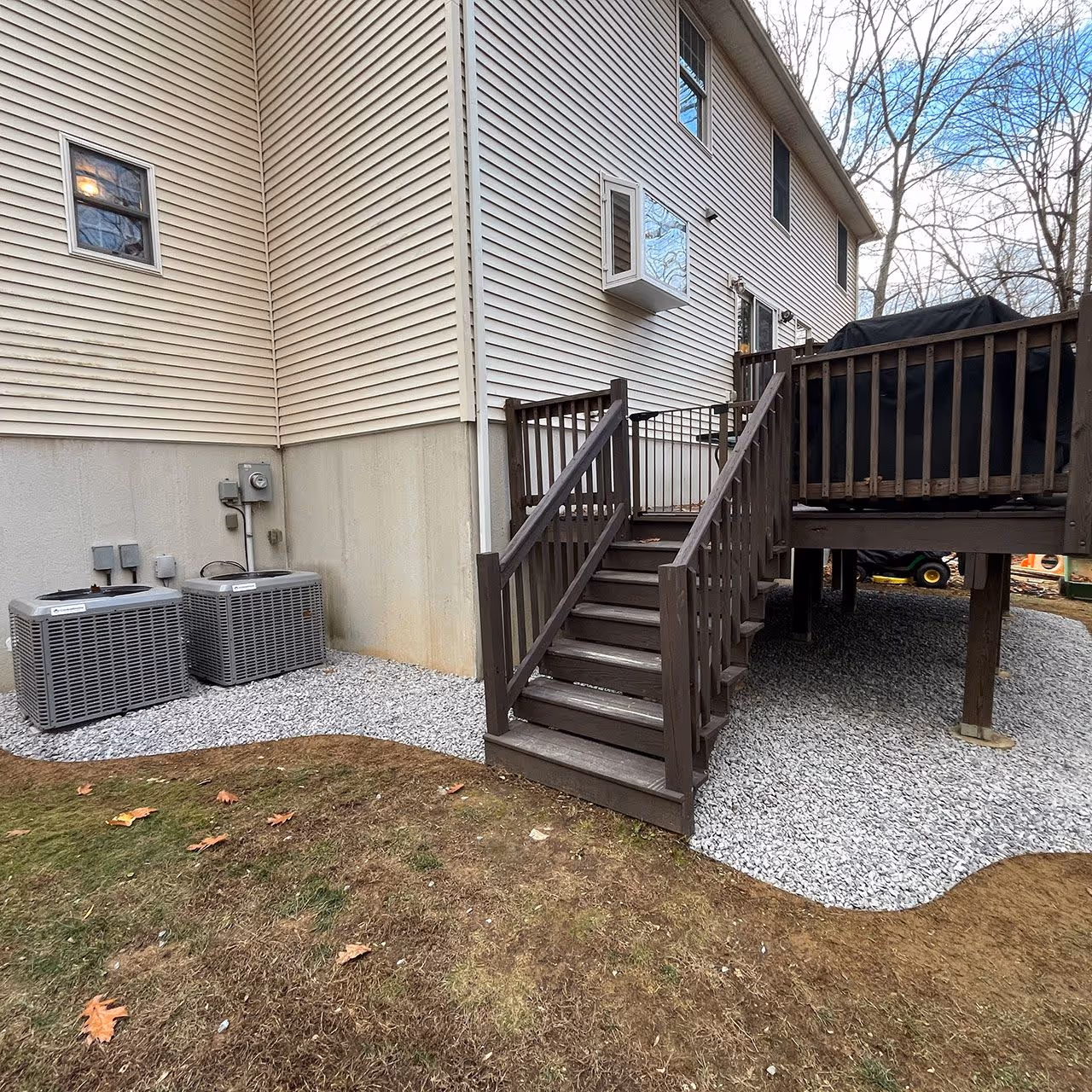 Lawn edging service creating clean defined borders along backyard by Higher Ground Property Management LLC in Red Hook NY