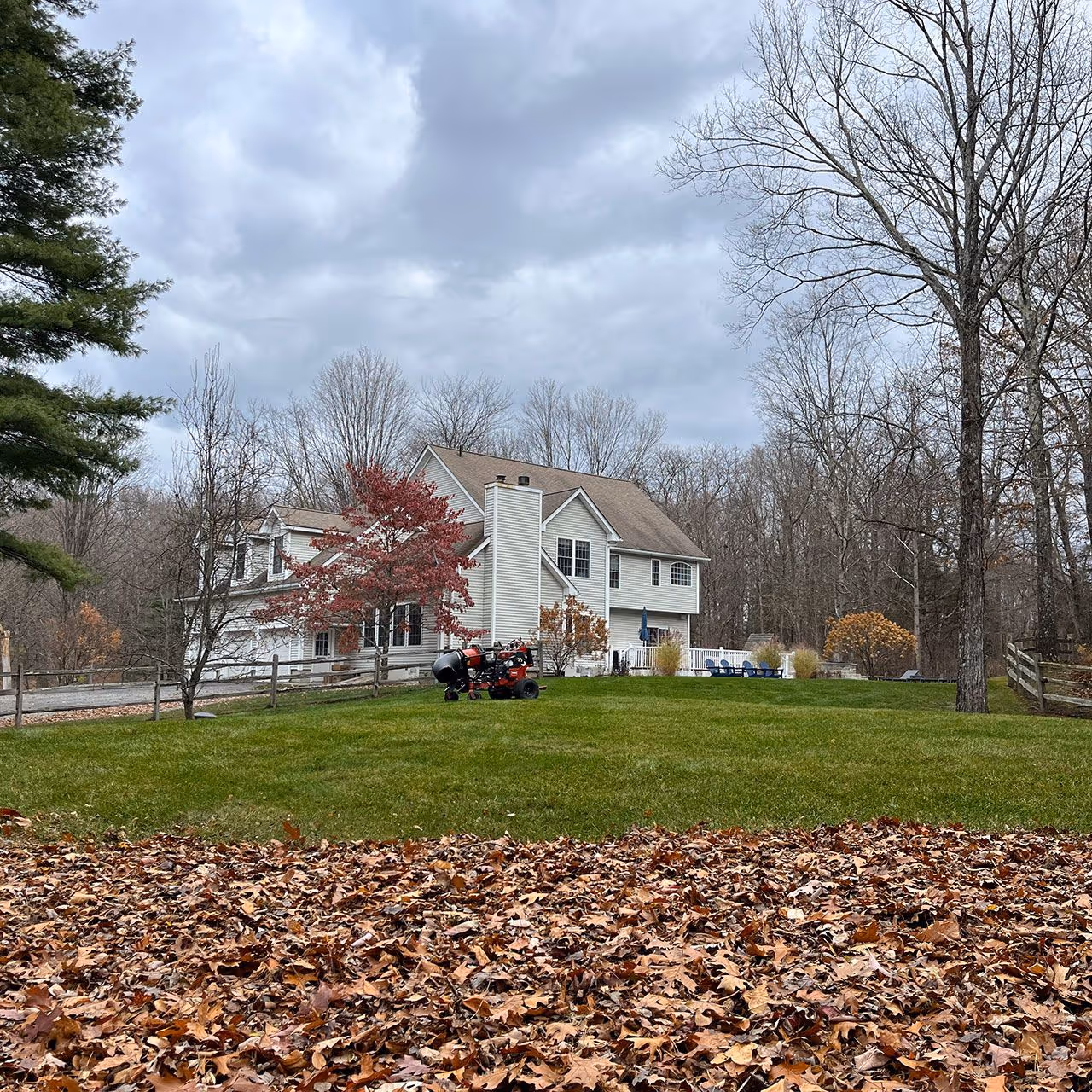 Fall cleanup service with leaf removal and debris clearing by Higher Ground Property Management LLC in Red Hook NY