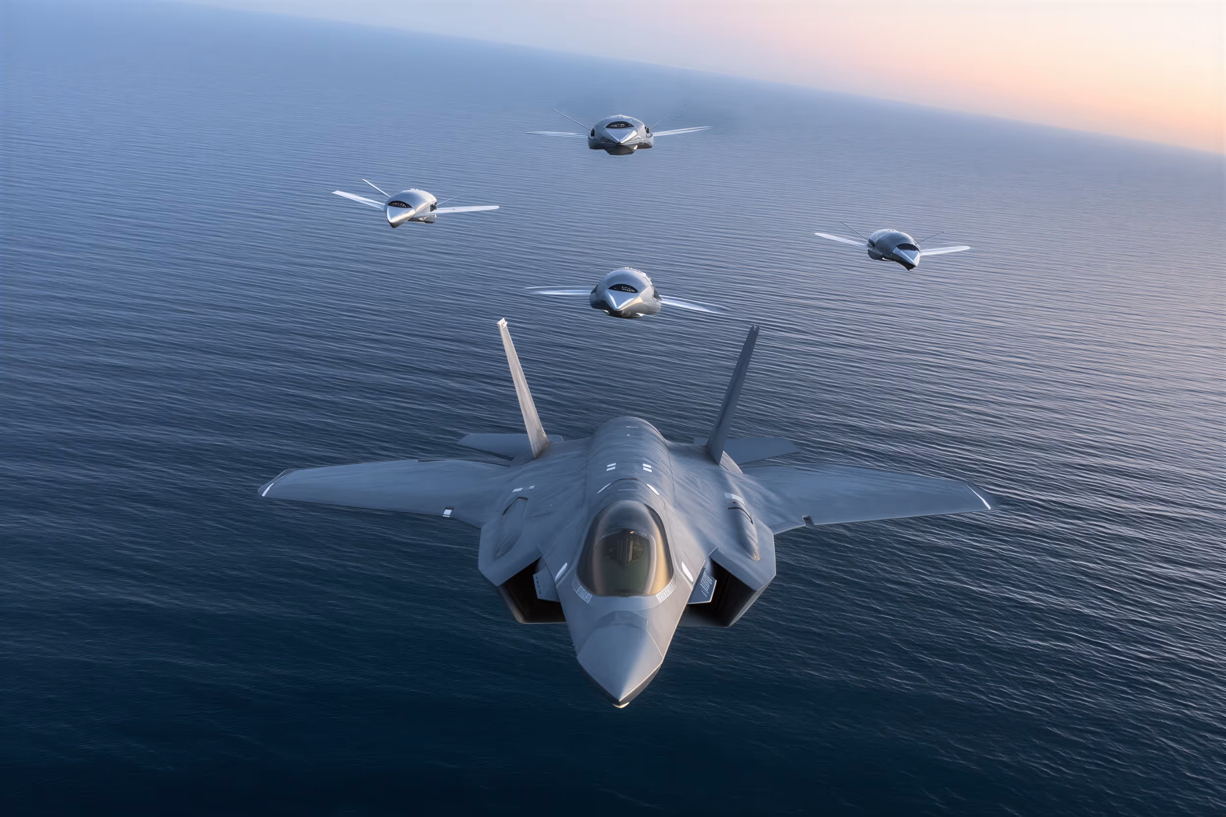 F-35 fighter jet flying over the ocean accompanied by four smaller drone aircraft.