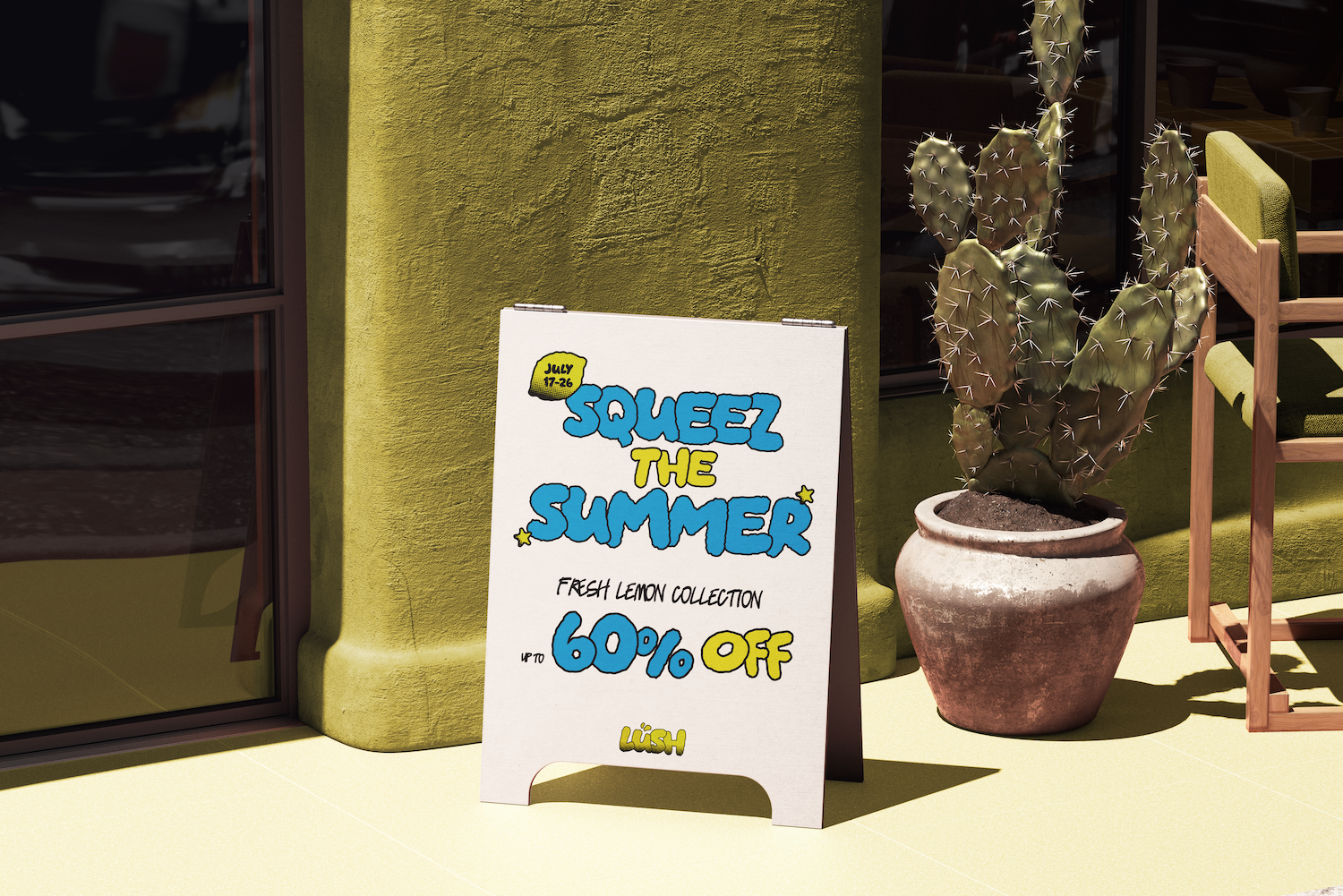 Outdoor sign on a yellow wall advertising up to 60% off a fresh lemon summer collection.