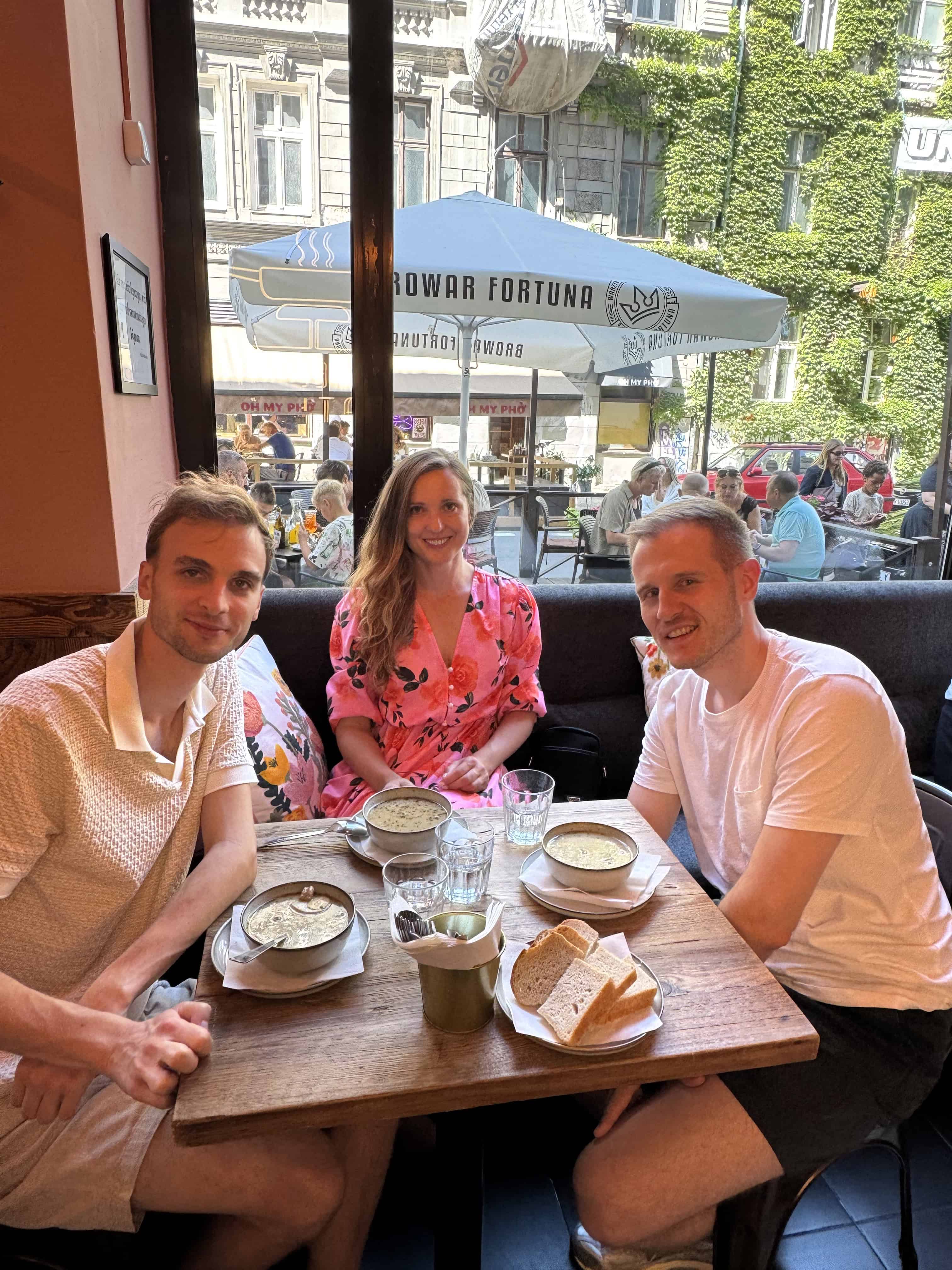 Private food tour in Krakow with guests dining in a local restaurant