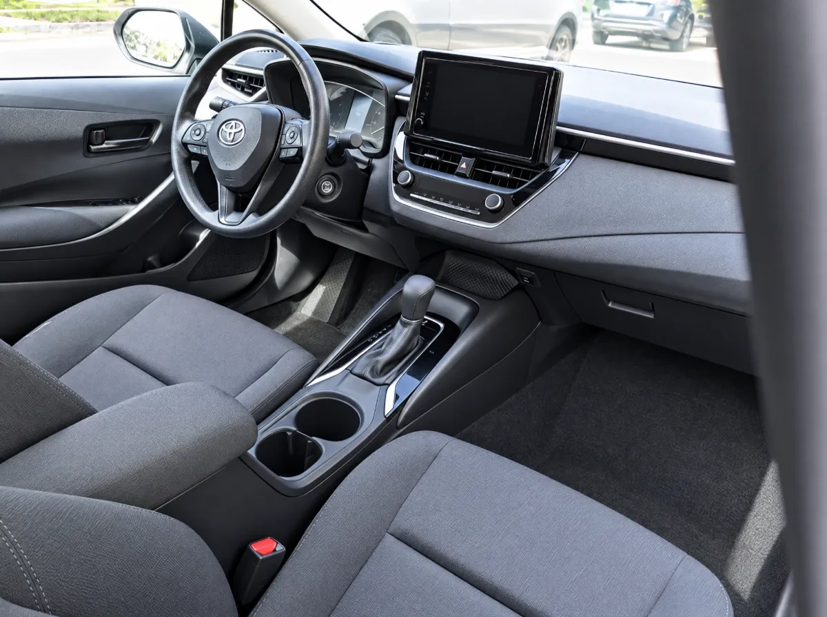 Driver's seat, steering wheel and dashboard of the Toyota Corolla used for LLG driving lessons