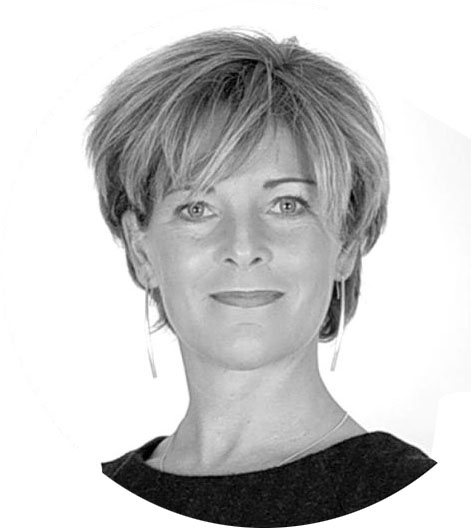 Silhouette of a person with short hair against a muted pink background.