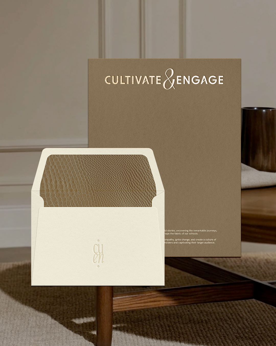 Gold and beige logo and stationery design for a communications specialist brand