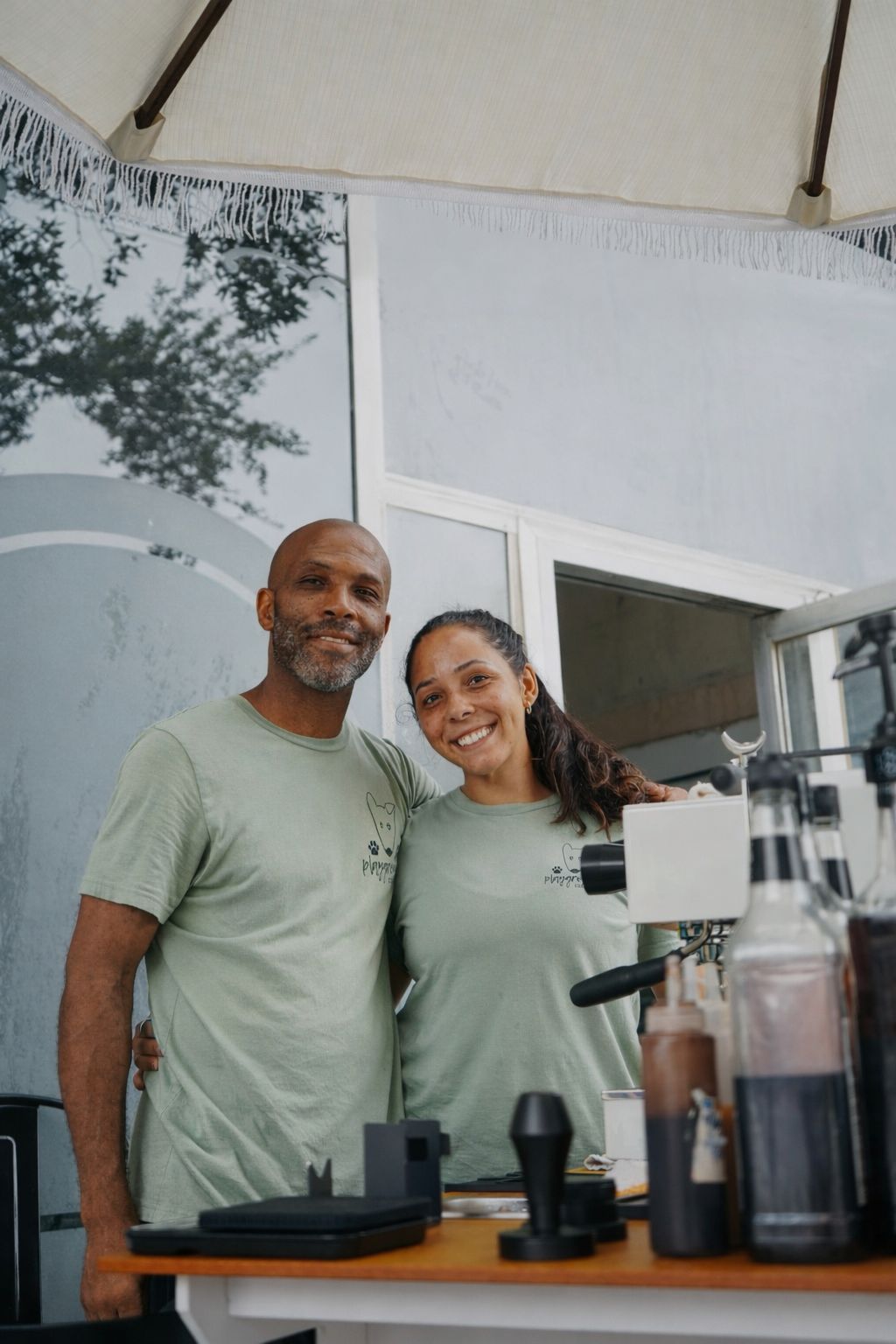 Dyllan and Roy Allen serving specialty coffee at the Sage's Playground espresso cart in Tampa Bay