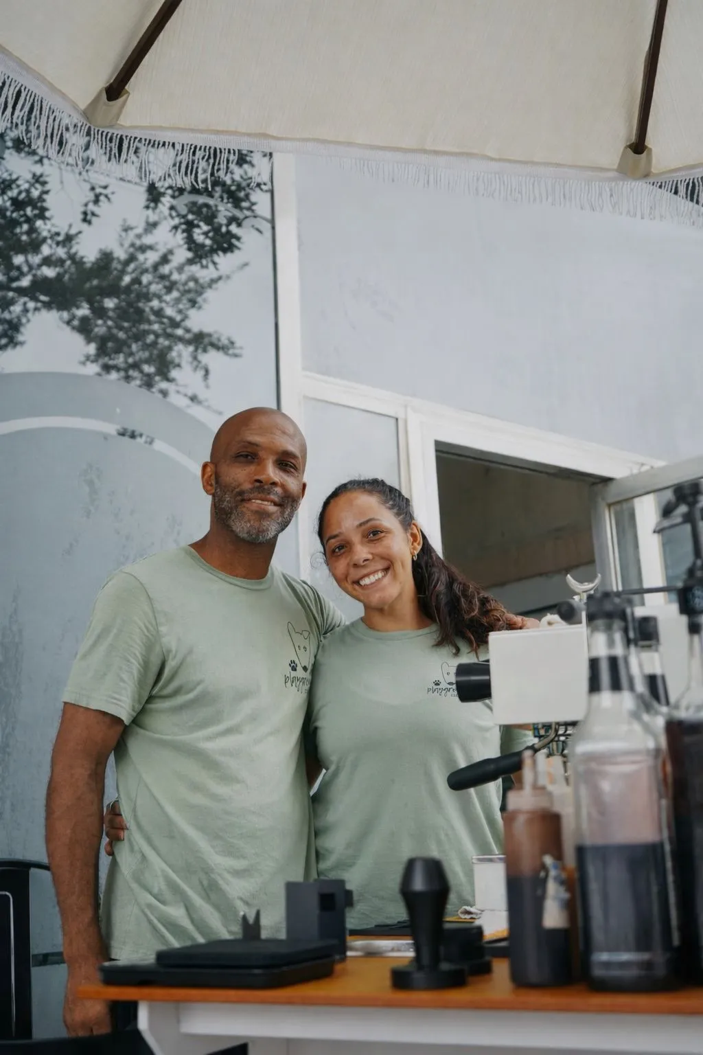 Dyllan and Roy Allen serving specialty coffee at the Sage's Playground espresso cart in Tampa Bay