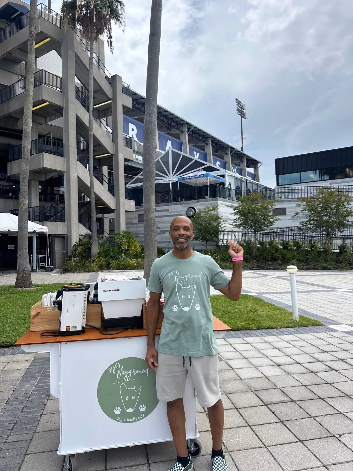 Roy Allen beside the Sage's Playground coffee cart at Steinbrenner Field for the Tampa Bay Rays 2025 season