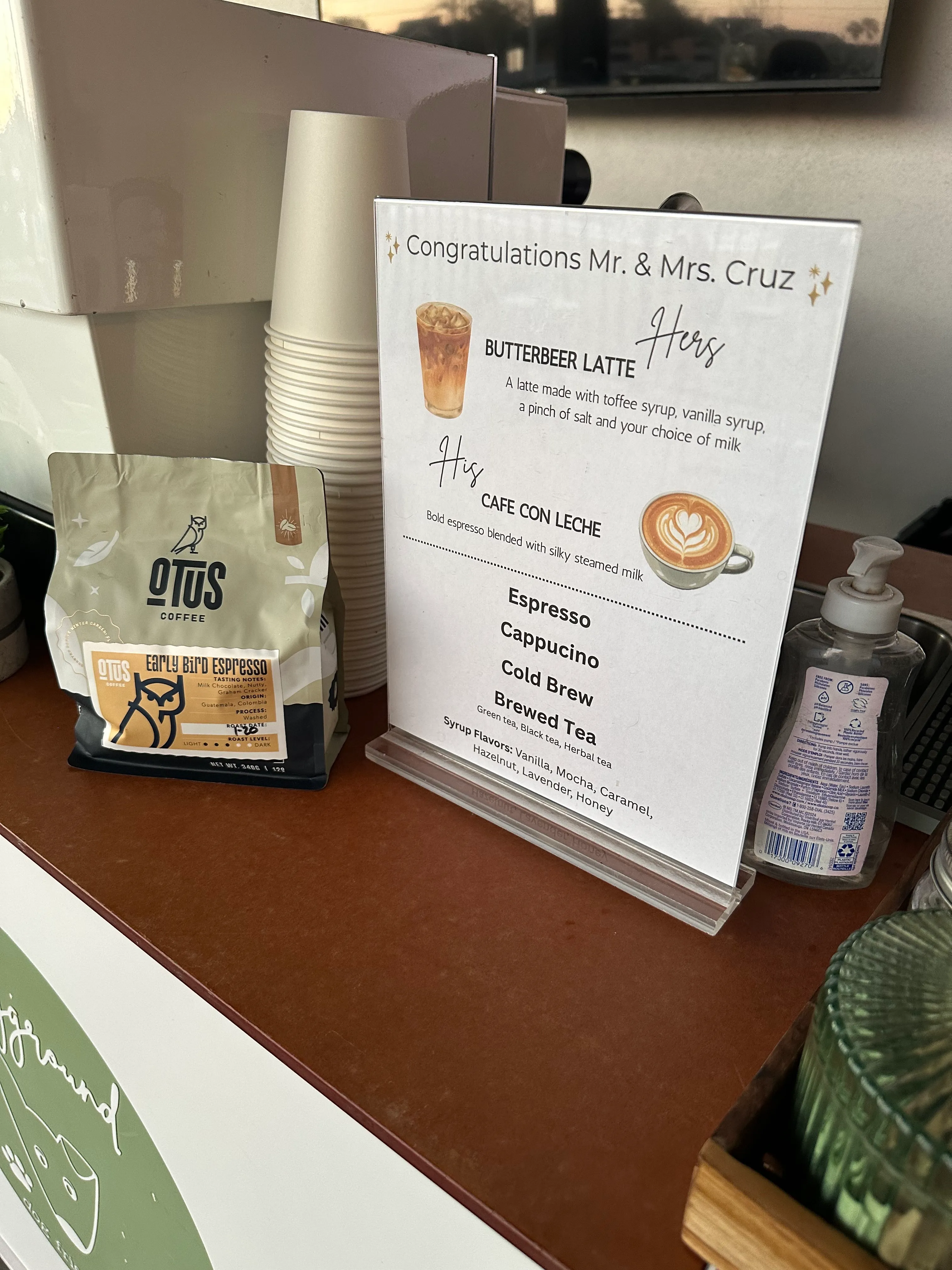 Custom wedding coffee menu displayed on the Sage's Playground cart at a Tampa Bay wedding
