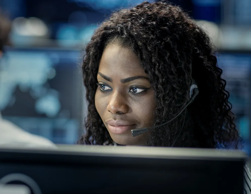 A 9-1-1 telecommunicator on the job.