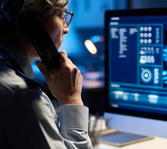 An emergency medical services professional reviewing electronic patient care reports.