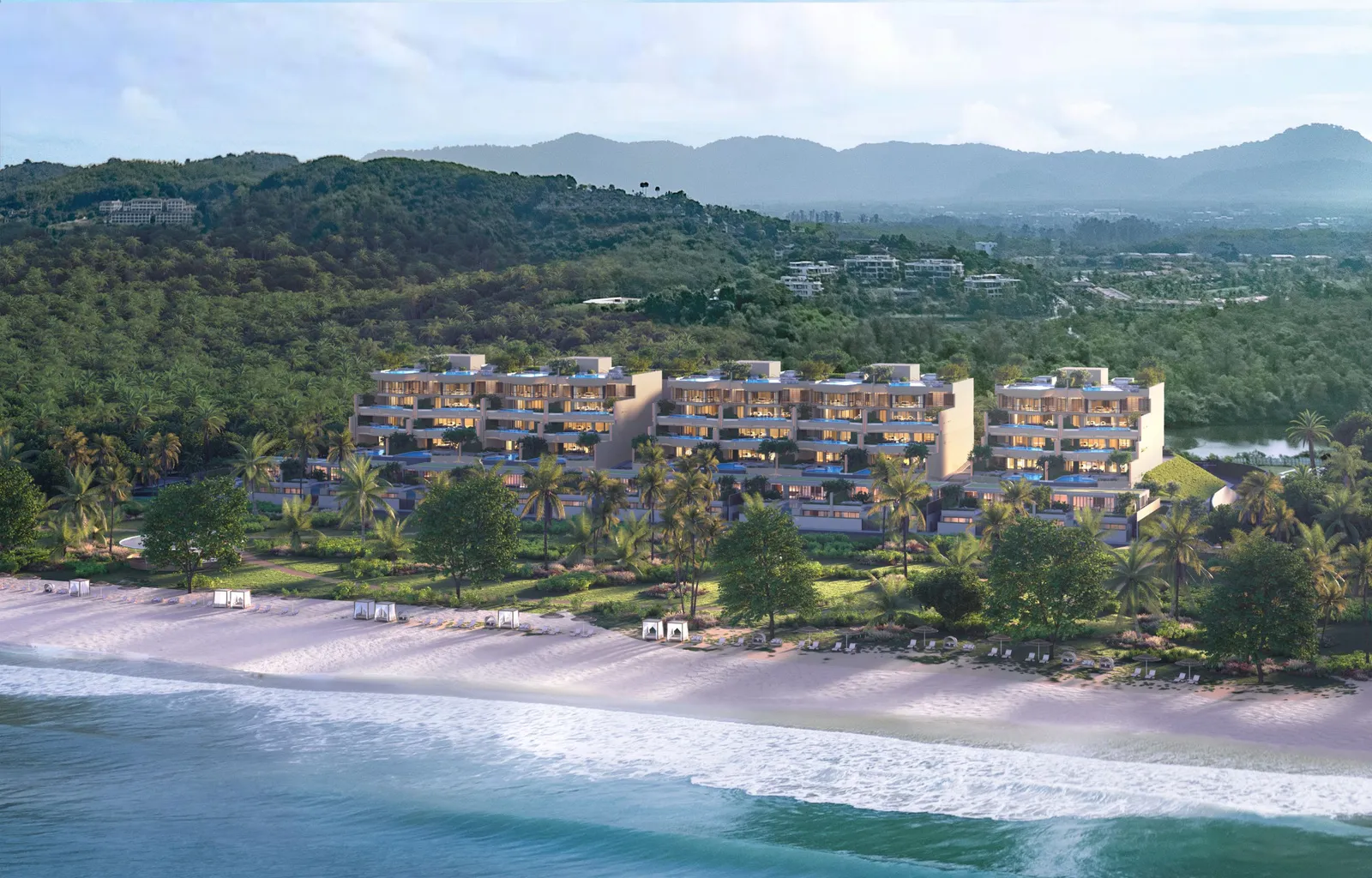 Beachfront elevation of Sirena residences at dusk