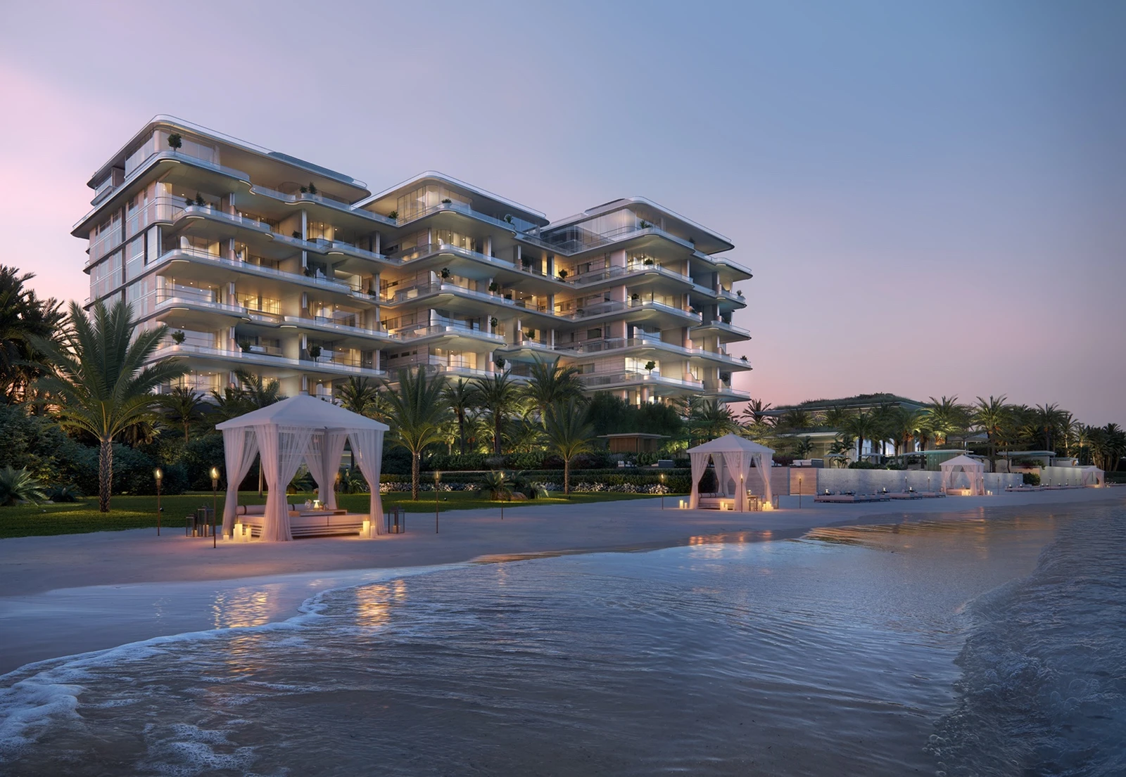 Beachfront view of ORLA residences at dusk on Palm Jumeirah