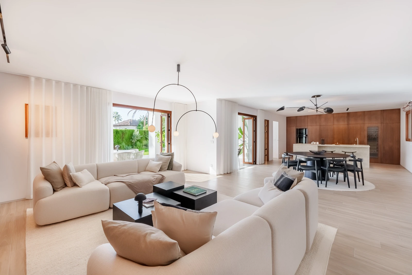 Open-plan living, dining, and kitchen from seating area