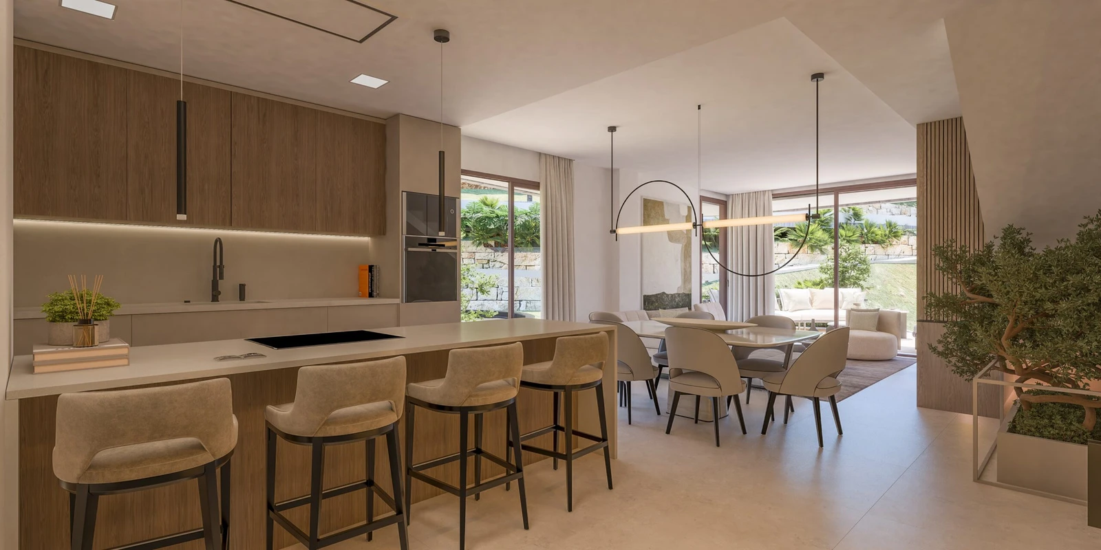 Open kitchen and dining area with garden-facing glazing
