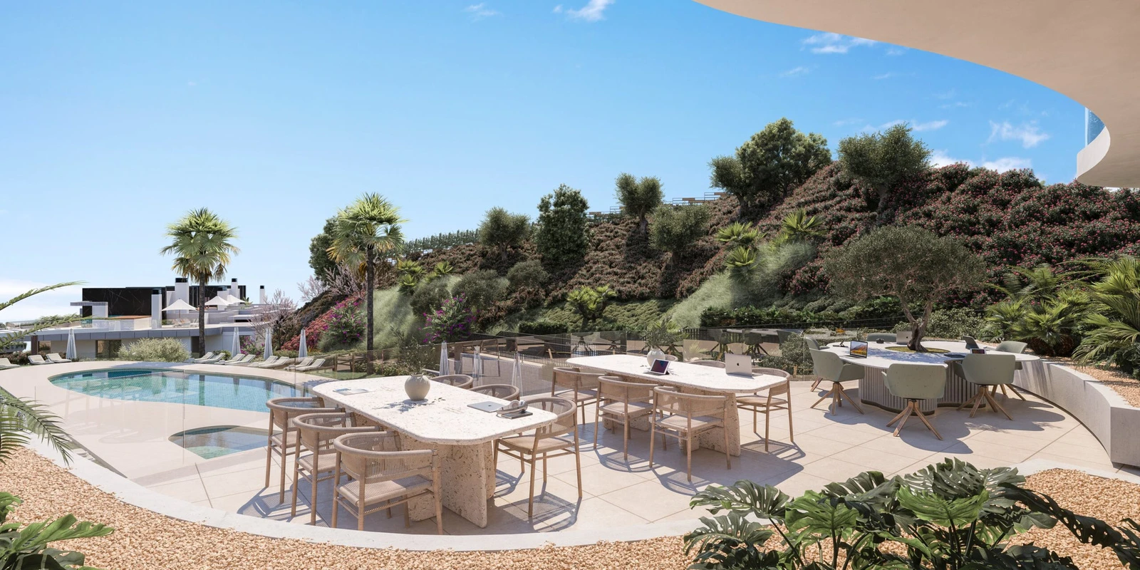 Communal pool terrace with outdoor work and dining areas